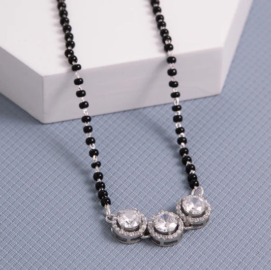 Elegance Redefined: The Beauty of Eevee's Three Stone Silver Mangalsutra